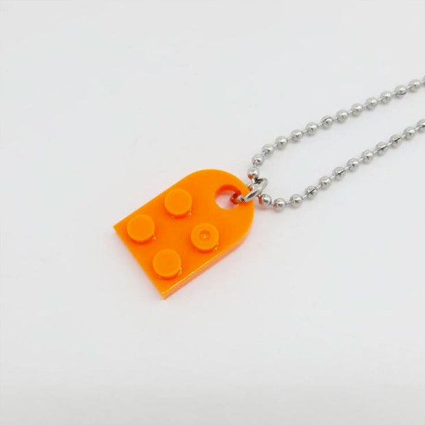 Collier Lego cœur rouge, fleur, se partage en 2 – Luckyfind